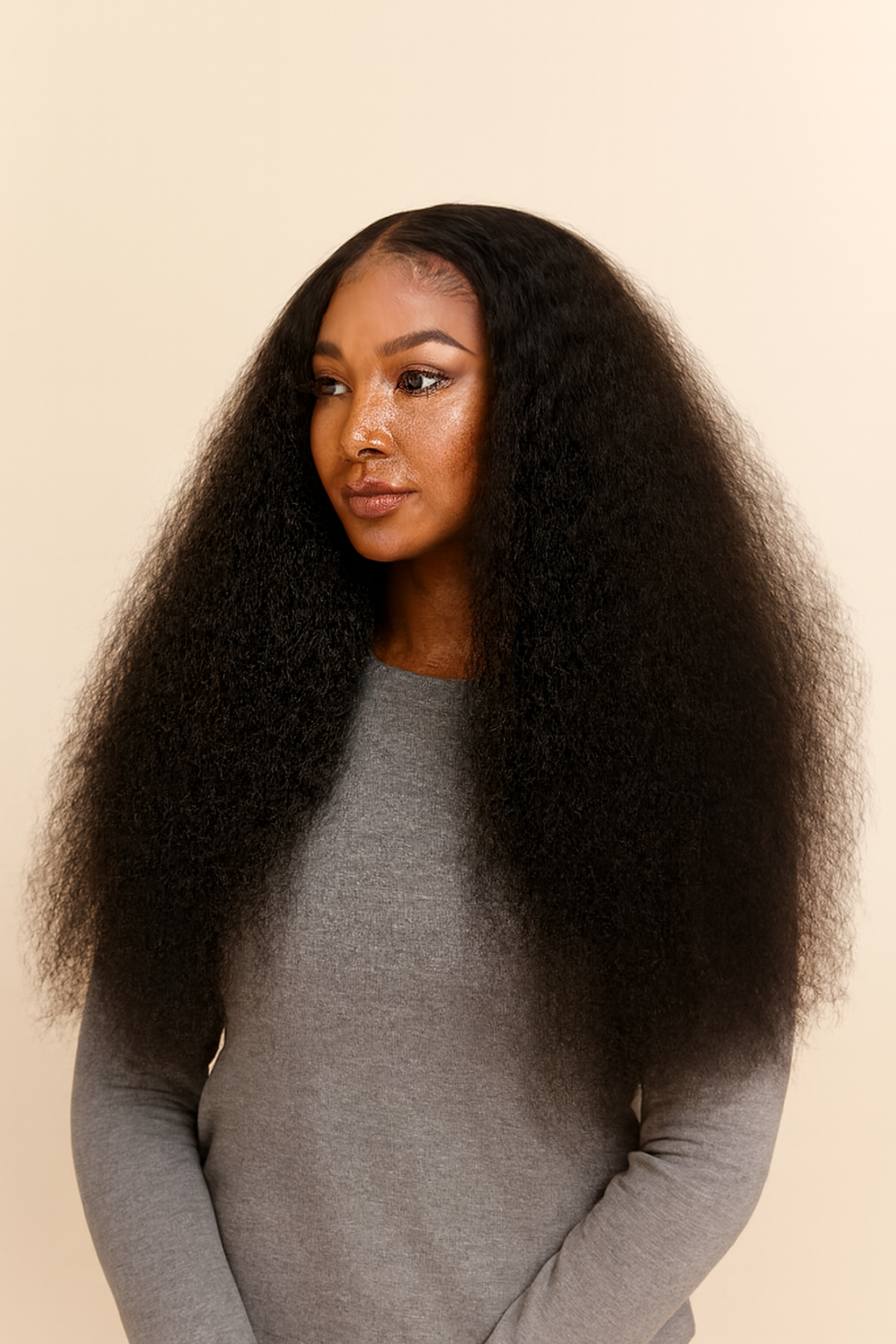 Model wearing the Deep Wave Human Hair Wig by Hair Labs