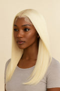 Model wearing the Platinum Blonde Bone Straight Human Hair Wig by Hair Labs