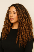 Model wearing the Highlight Curly Human Hair Wig by Hair Labs