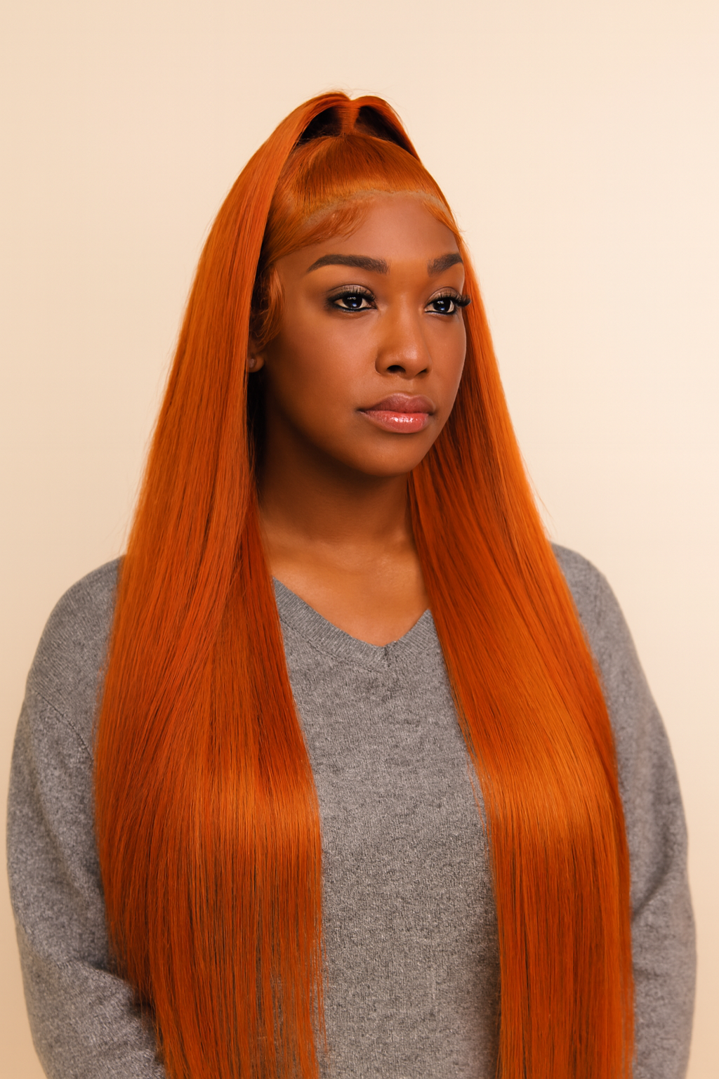 Model wearing the Ginger Copper Straight Human Hair Wig by Hair Labs