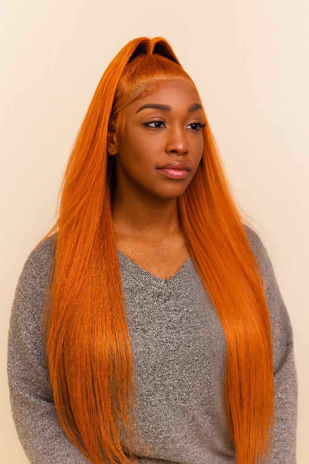 Model wearing the Ginger Copper Straight Human Hair Wig by Hair Labs